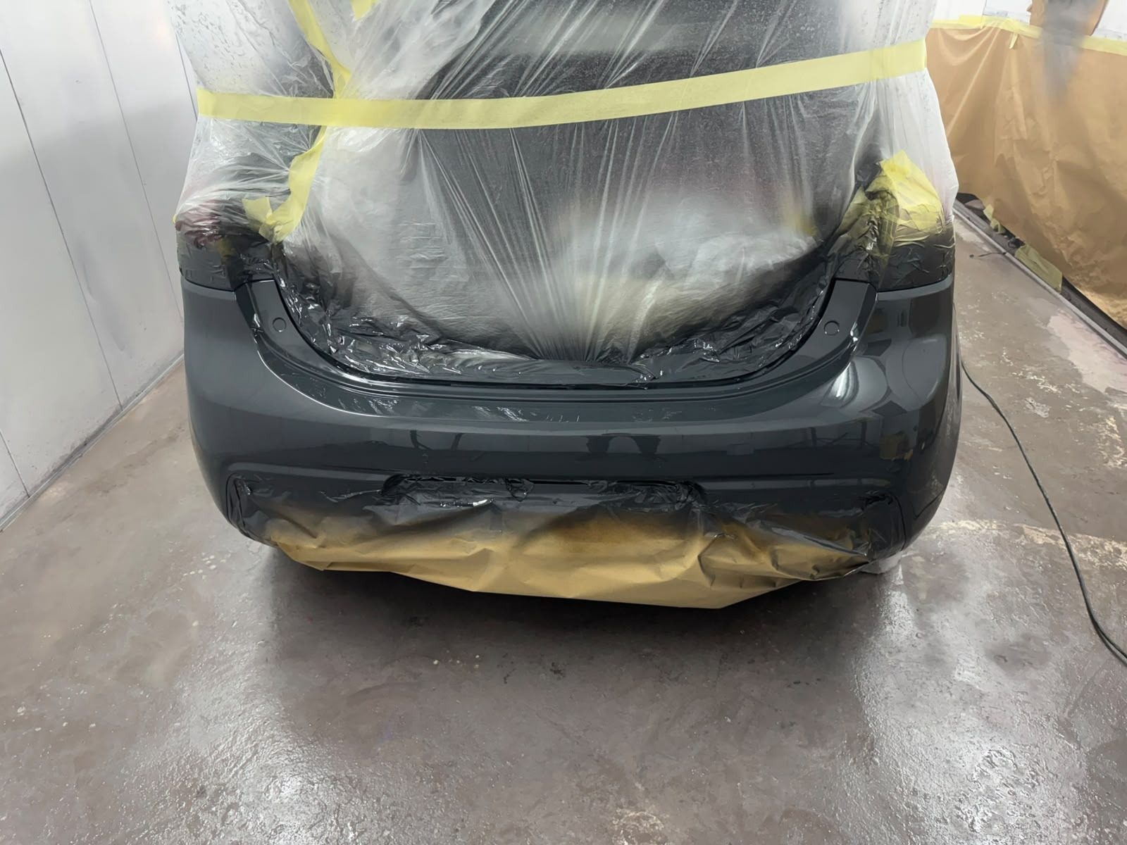 Rear bumper, masked for paint